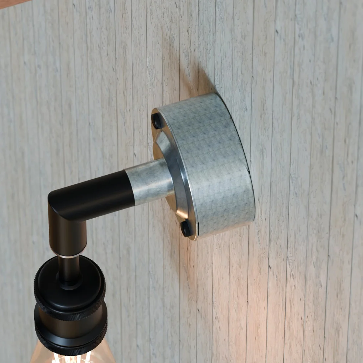 20mm conduit pipe fitting made of galvanized steel, a dome cover fitted over a conduit in metallic finish.