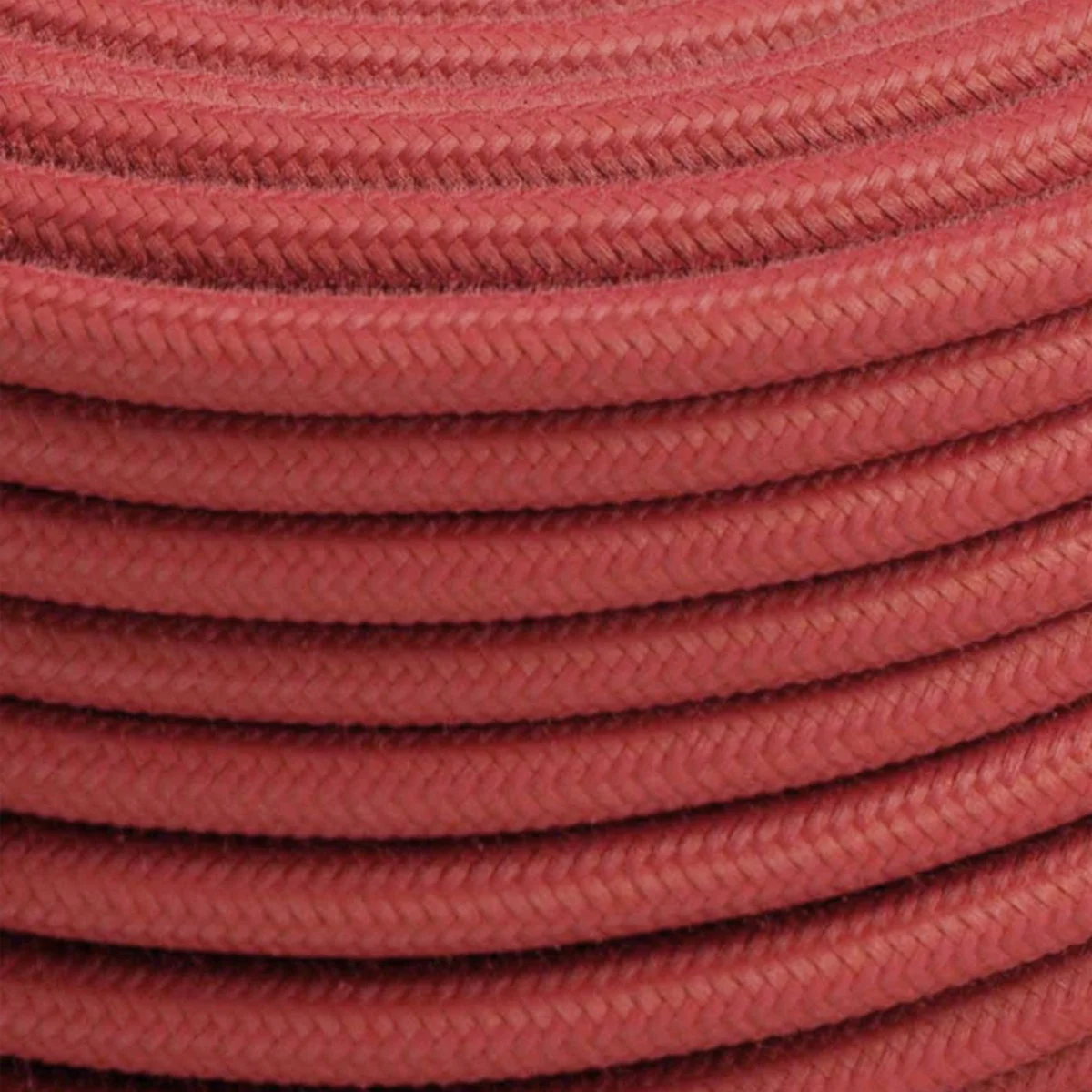 Peach fabric cable a short roll of 0.75mm braided cable with visible Italian fabric weave and PVC insulation.