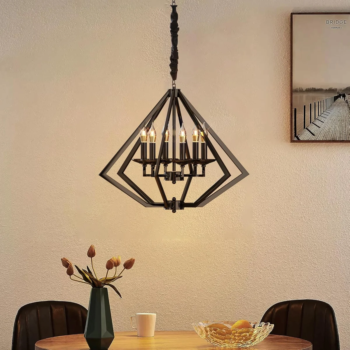 Dimmable ceiling light: brushed nickel diamond chandelier with 6 bulbs, suspended from adjustable cord.