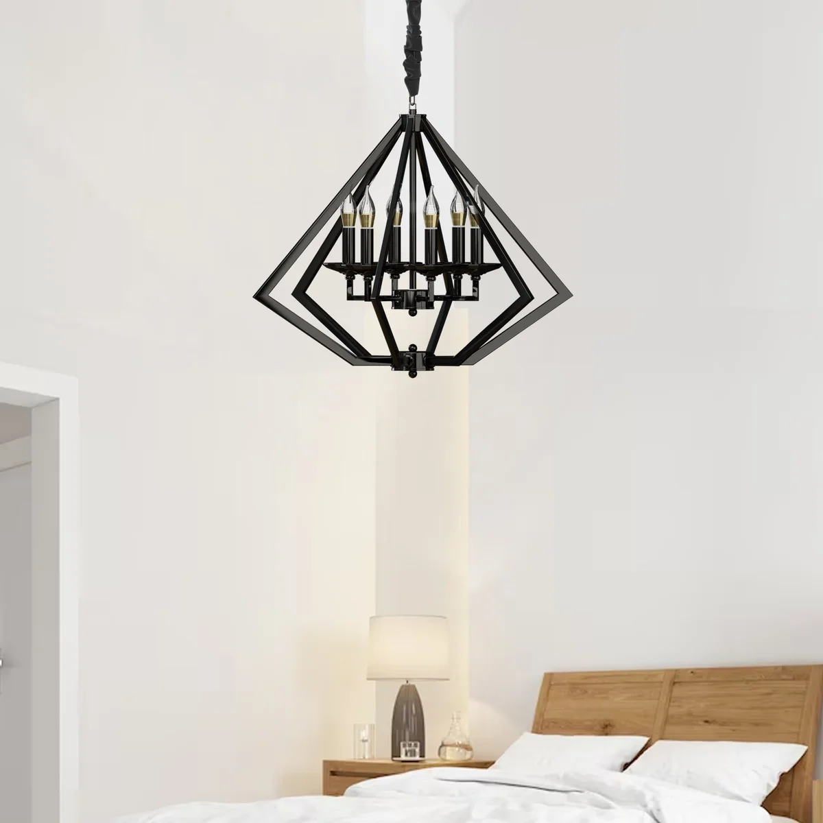 Diamond-shaped 6‑light brushed nickel chandelier hanging from ceiling, with adjustable cord and sleek metal finish.