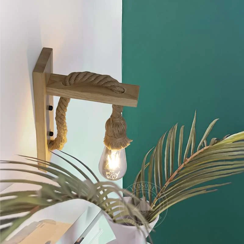 Rustic wooden wall lamp featuring hand‑woven hemp rope wall light, exposed E27 base, wall‑mounted industrial style.