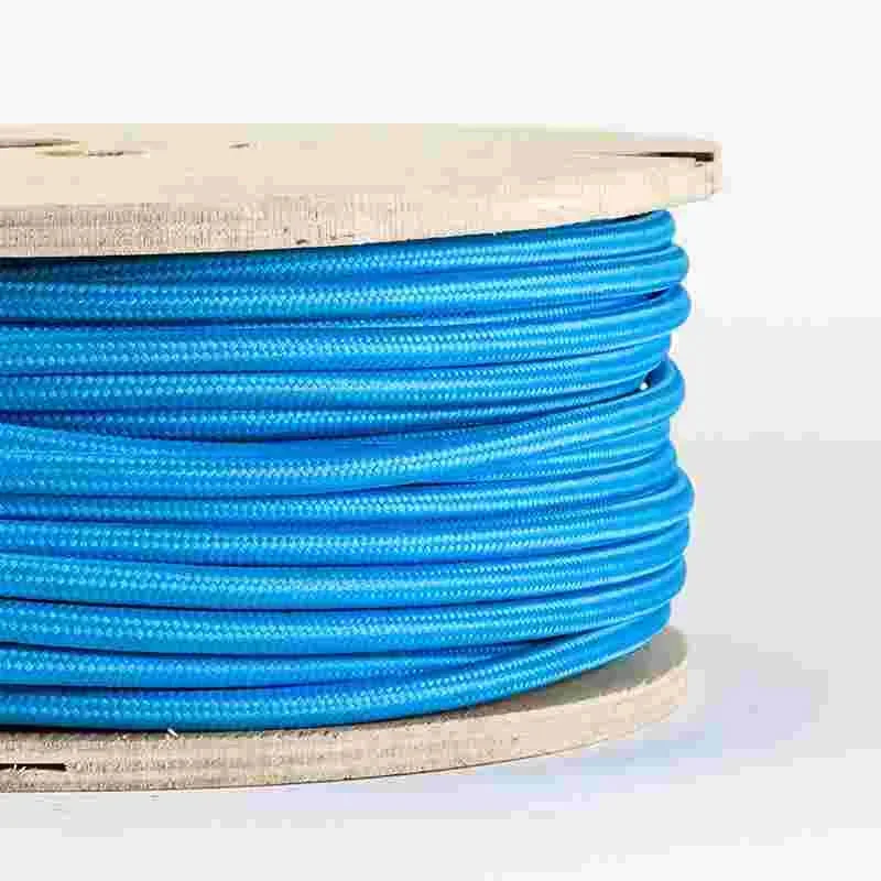 10 m blue fabric cable with round vintage braided jacket and 0.75 mm copper cores, shown in a continuous roll.