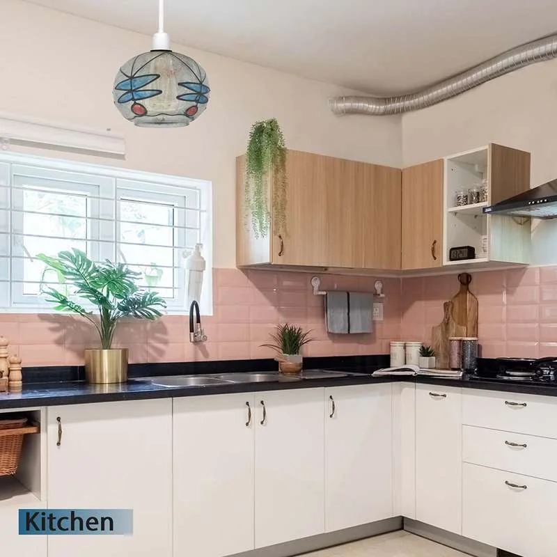 Hand‑crafted glass shade in a modern Tiffany‑style pendant, 15 cm by 10.5 cm, hanging as an indoor down light shade