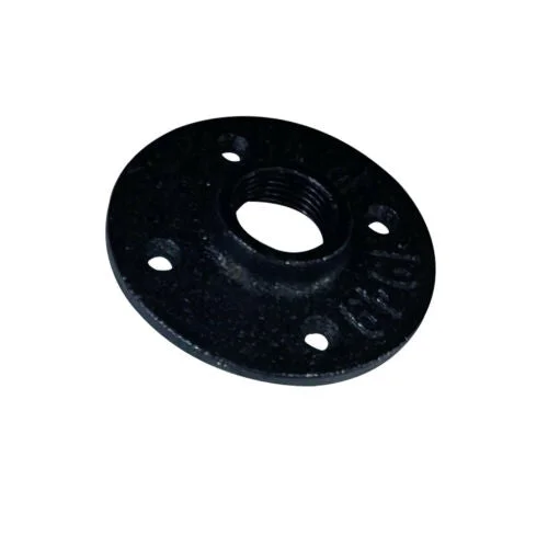 3/4 BSP floor flange in black cast iron, three bolt holes visible, mounted on a 3/4" pipe