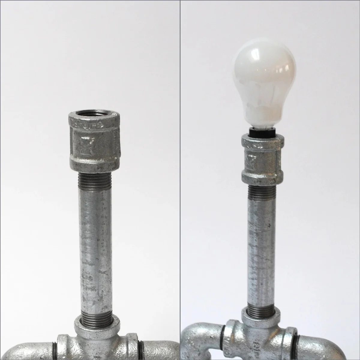 Galvanized cast‑iron 3/4 pipe coupling with threaded ends and four mounting holes, shown in a side view.