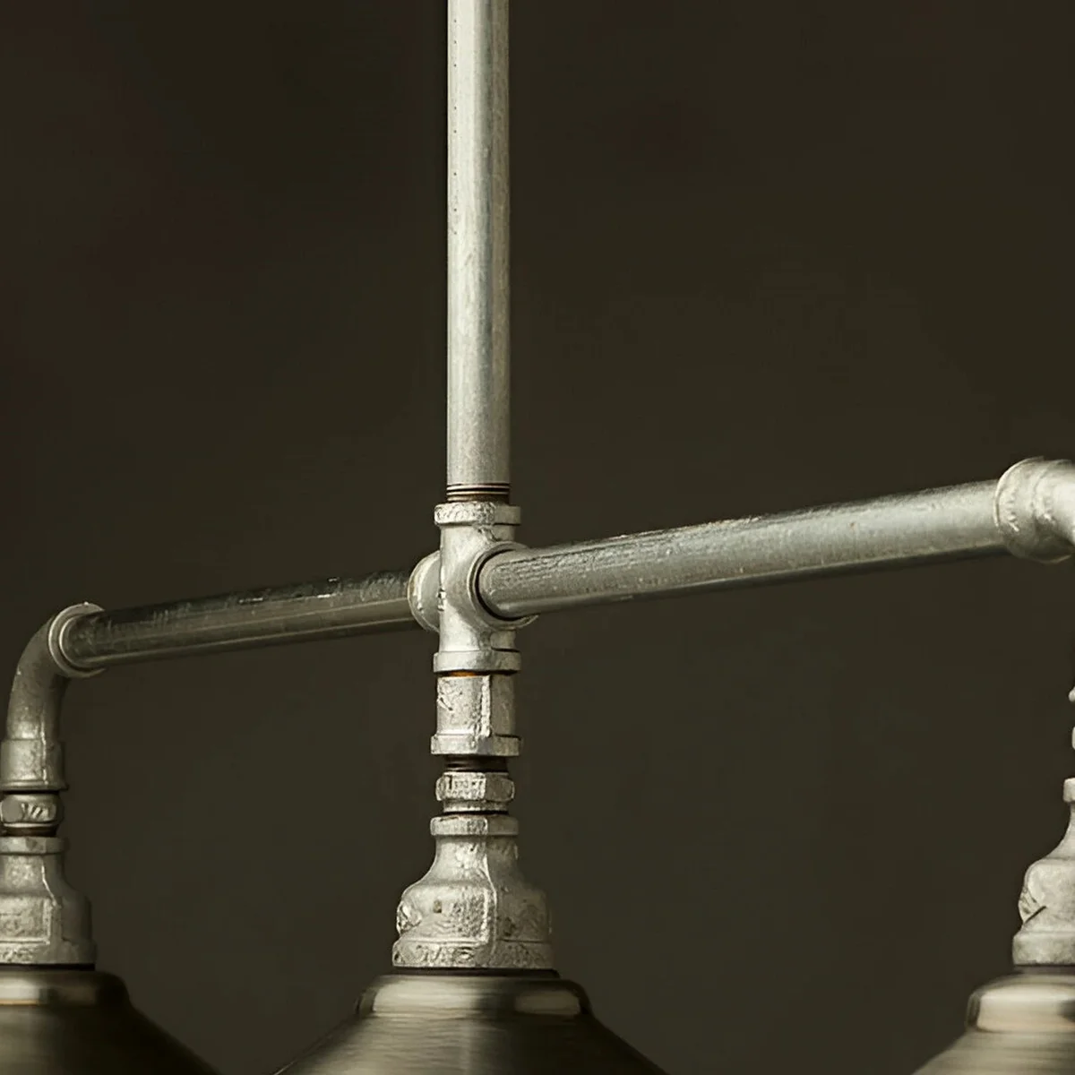 Galvanized cast iron pipe fittings, a single axial malleable iron nipple for indoor/outdoor use.