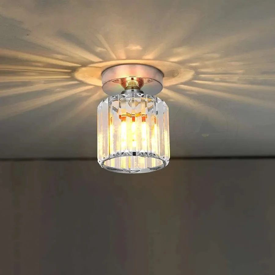 Semi‑flush round crystal ceiling light with gold‑metal frame and LED bulbs, stylish modern fixture