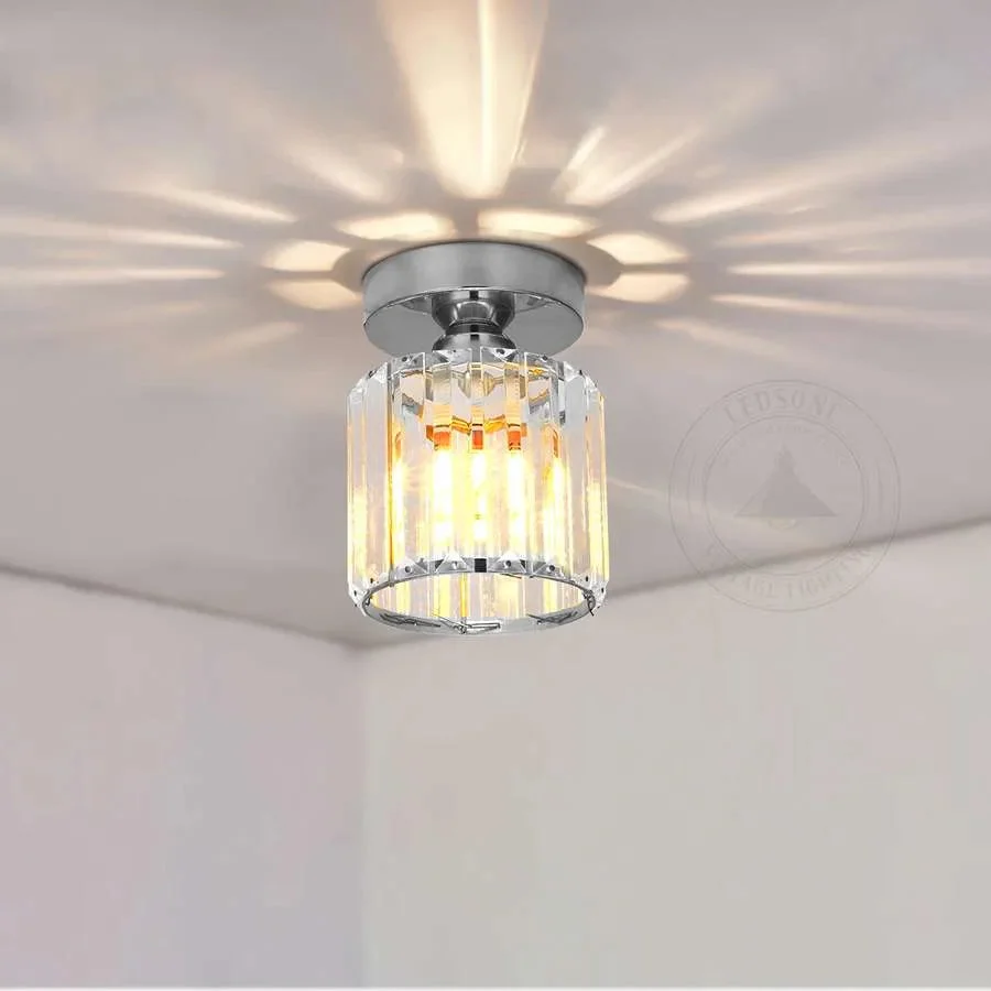 Round gold crystal ceiling light with semi-flush mount, metal base, LED‑powered, dimmable, modern design