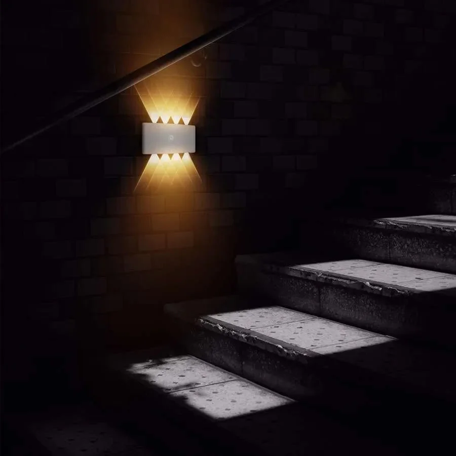 White rectangular outdoor LED wall lights with motion sensor, aluminum construction, 8W, warm white glow.