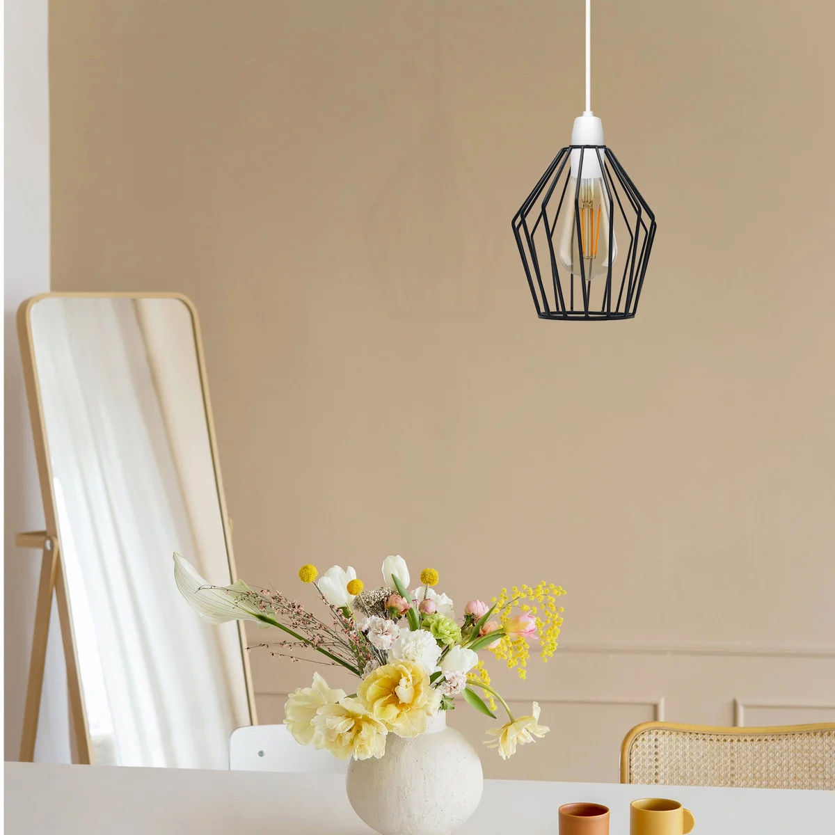 Diamond cage pendant lamp with rustic metal wire cage, rose gold finish, hanging from ceiling, modern industrial style.