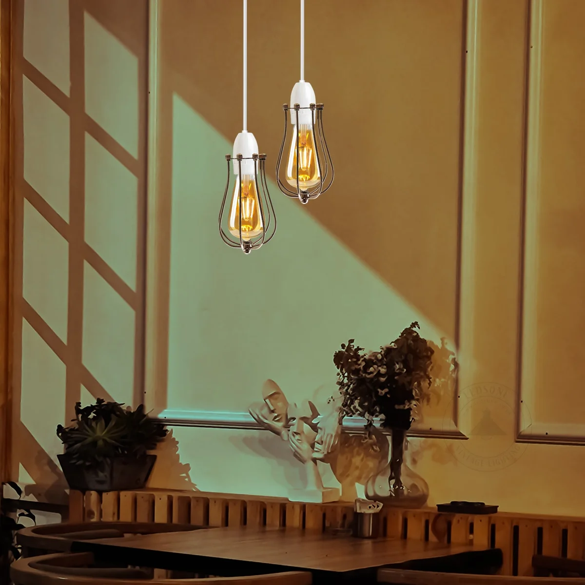 French gold balloon‑shaped industrial metal wall lamp in rustic cage design