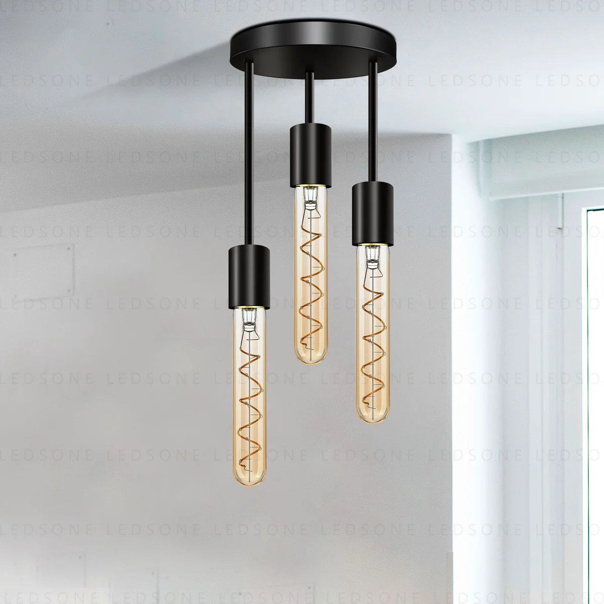 Modern industrial 3 way pendant lamp with round metal base and three E27 sockets.