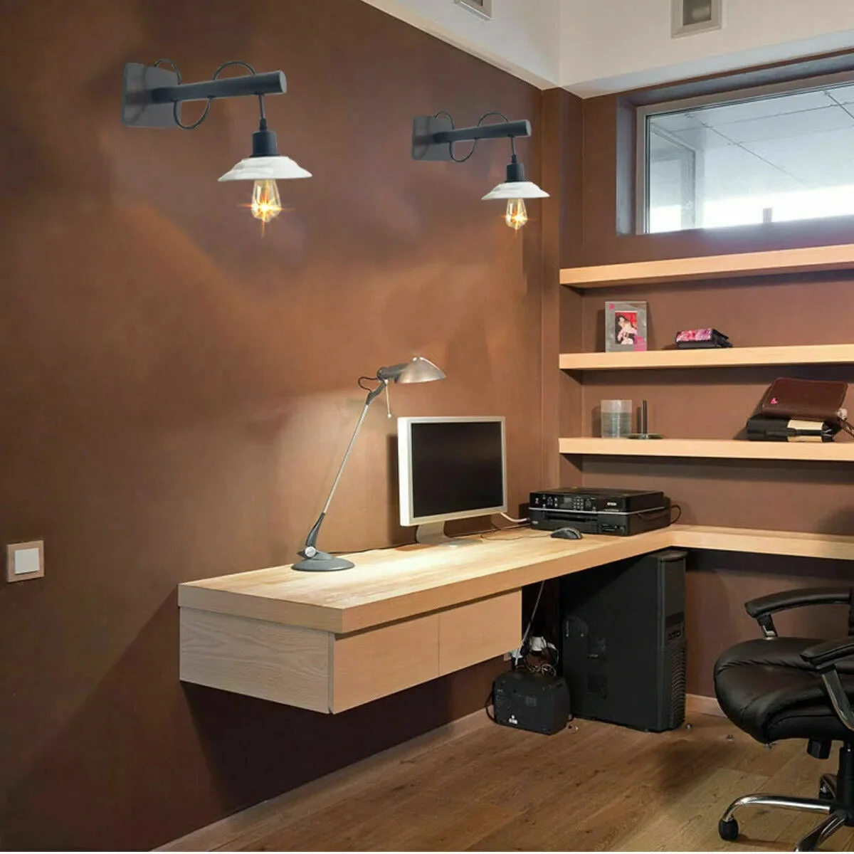 Modern mid‑century metal wall sconces with smooth PVC shades, two‑piece set mounted on light metal surface.