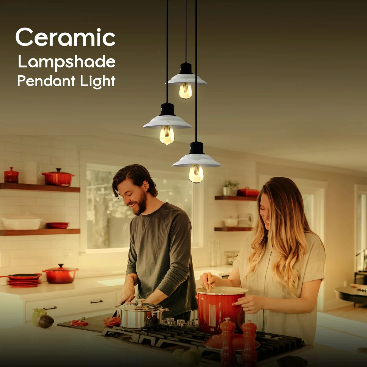 Black and white three‑piece ceramic pendant light with vintage glossy shade and metal stem, hung above dining table setting.