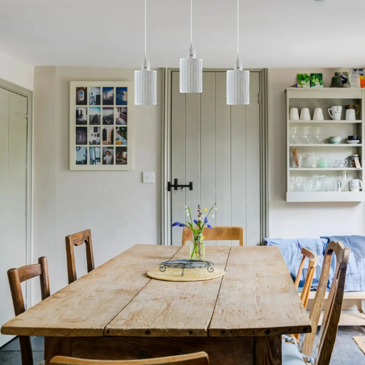 Adjustable pendant light with a black metal cage frame, three cage-style shades, hanging from a 95cm cord