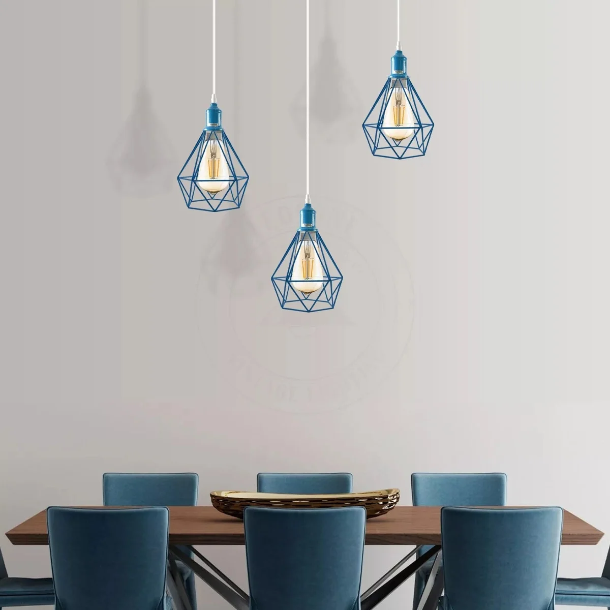 Three vintage metal cage pendant lights hanging from a spray‑painted metal hood, dimmable indoor light for stairways.
