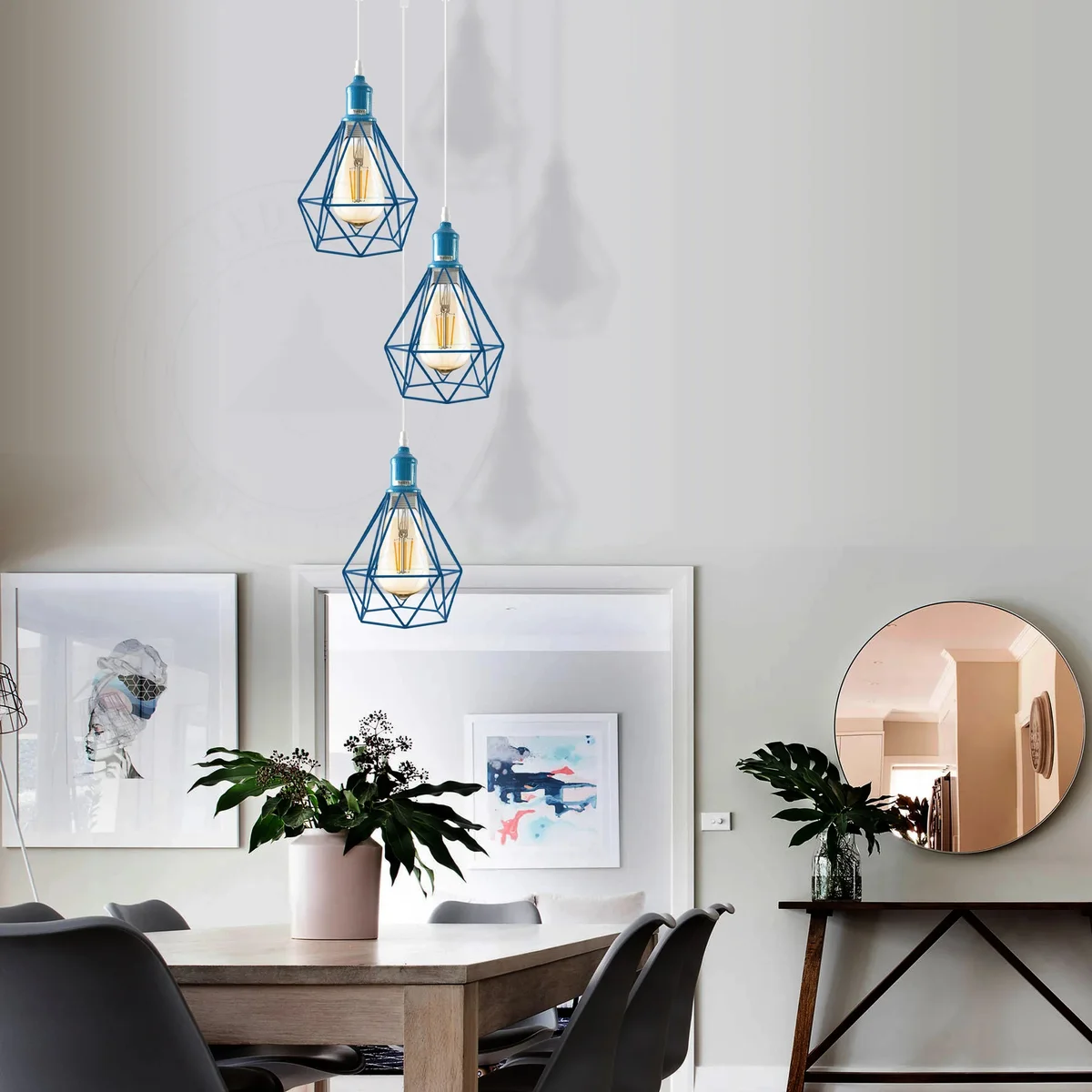 Three vintage metal cage pendant lights hanging, spray‑painted finish, bright white metal cages, suitable for indoor dimming.