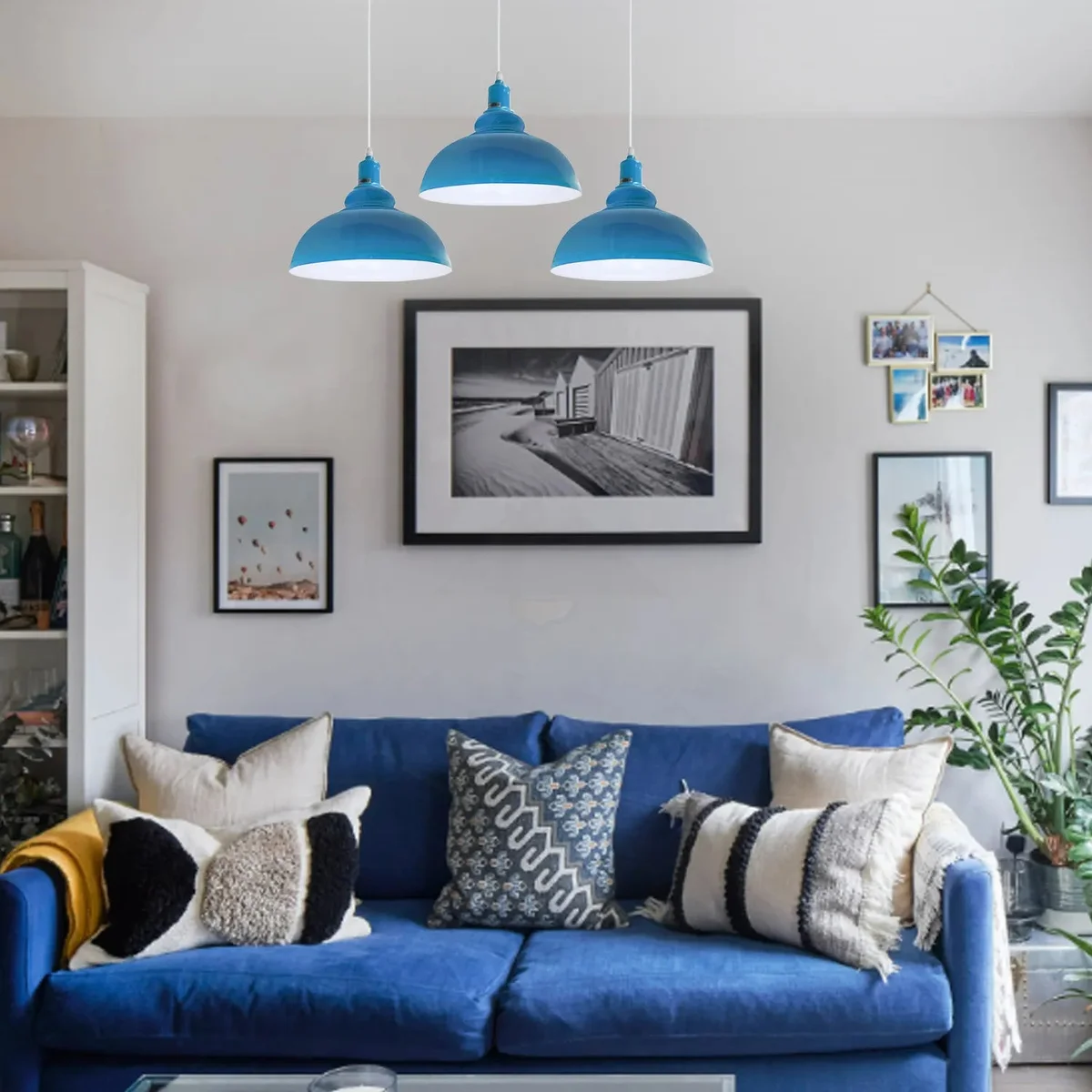 3‑way vintage pendant fixture hanging from adjustable cable, metal frame with PVC shade, fitted with E27 bulbs.