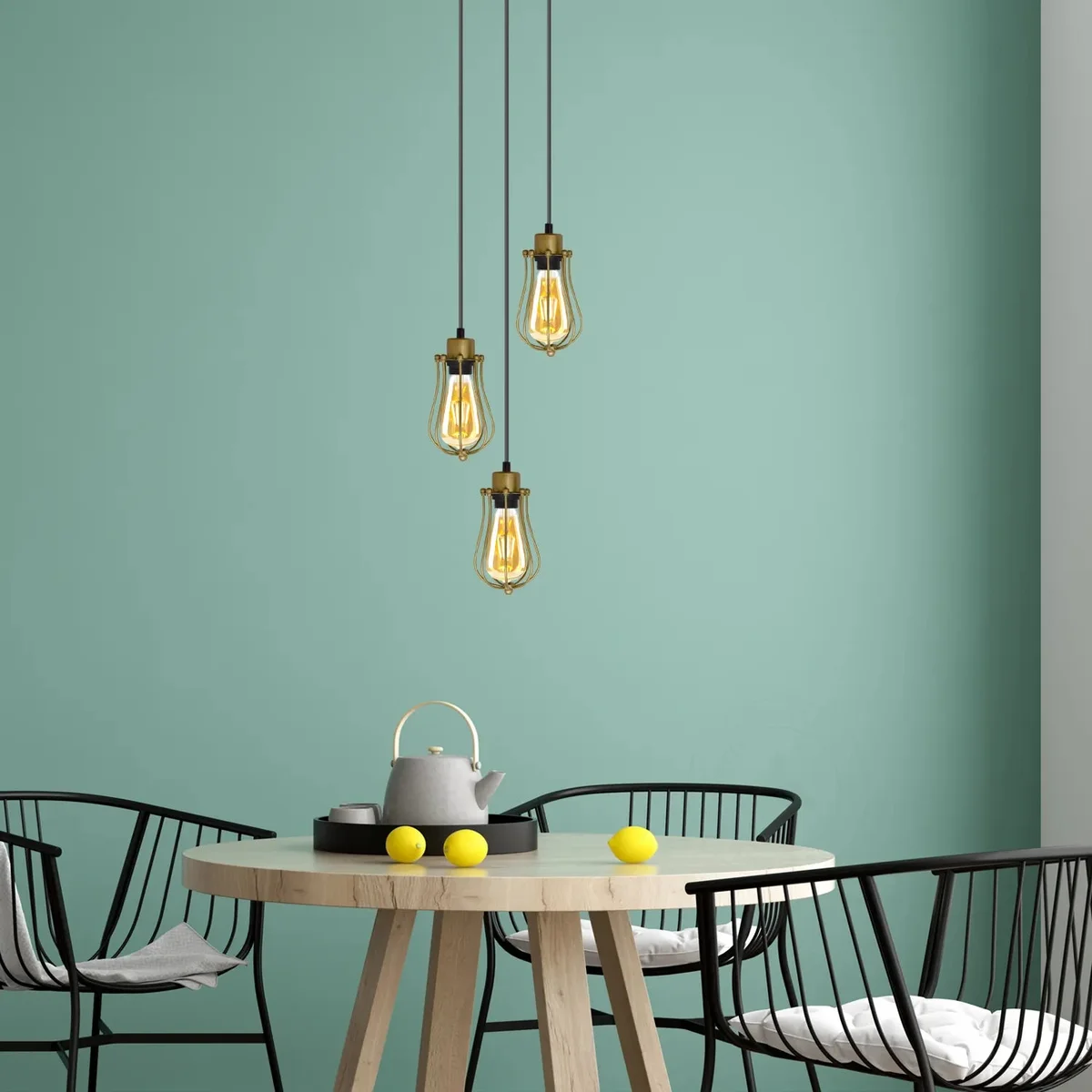 Yellow brass vintage pendant light with a balloon shaped metal cage.