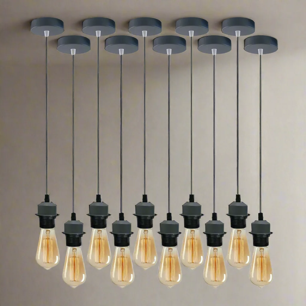 Grey vintage‑style pendant light holders with adjustable PVC cables, ready for E27 bulbs.