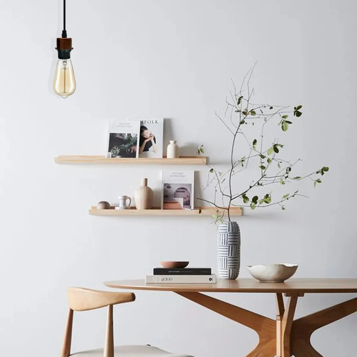 Red vintage industrial ceiling pendant light hanging from ceiling with metal ring and copper wire.