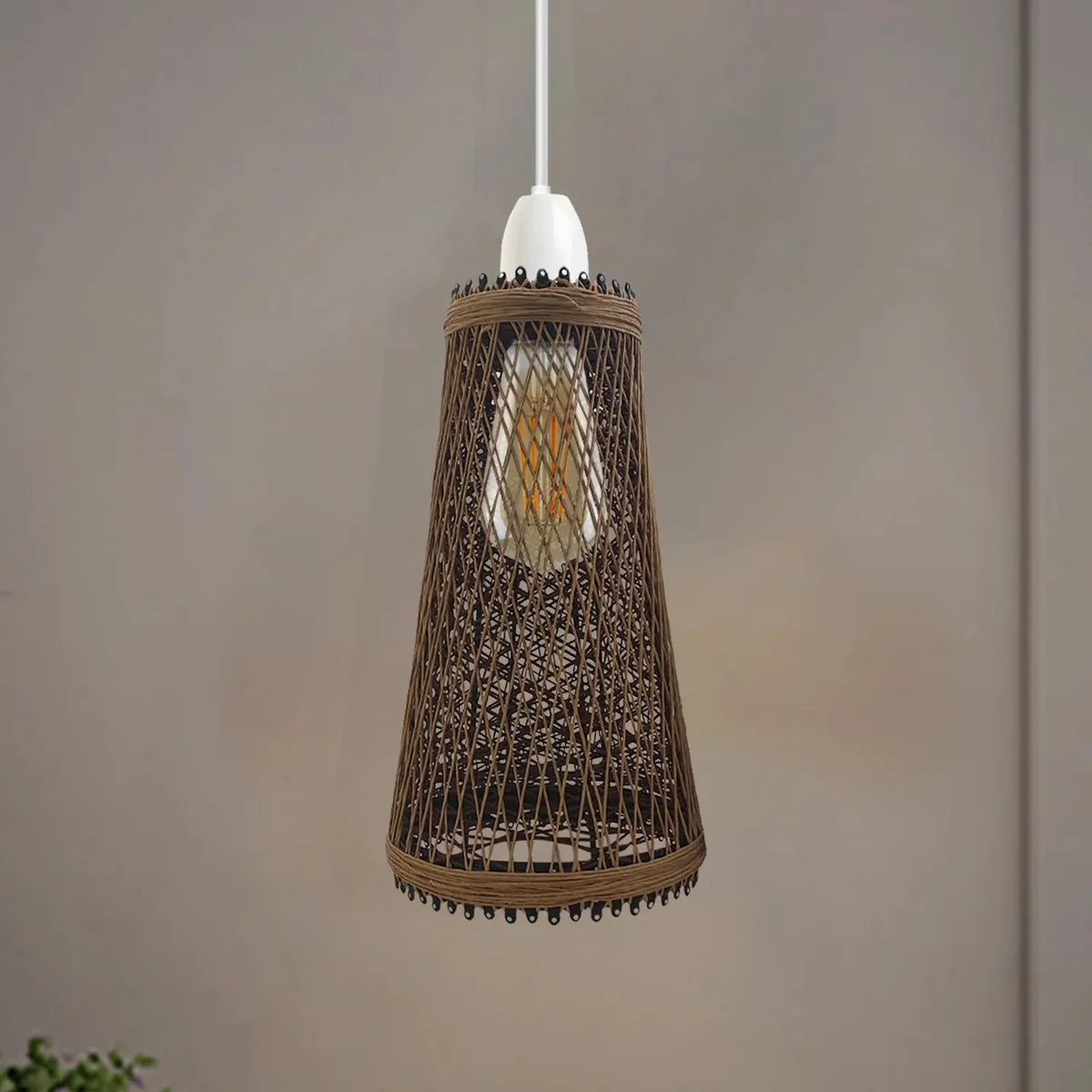 Vintage rattan lampshade over a table lamp, woven rattan material, simple reducer plate.