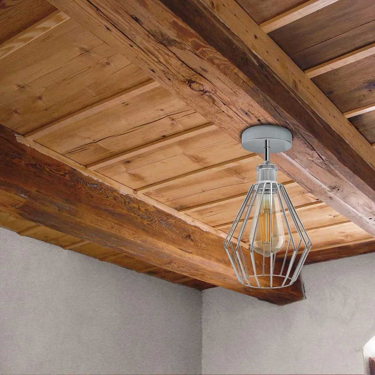 Flush mount metal cage light with diamond-shaped electroplated metal cage, 20cm diameter, 20cm high.