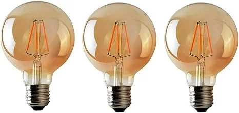 Three vintage LED filament bulbs in amber glass, each with visible filament, bundled together.