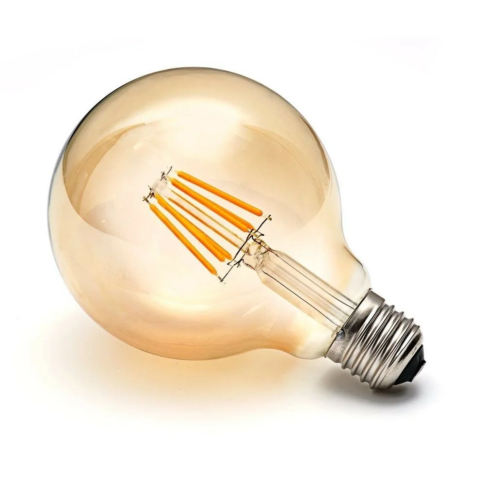 Amber glass dimmable LED bulb with 8W LED filament, E27 Edison screw base and visible straight filament.