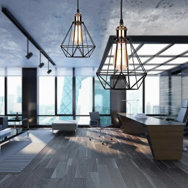 Black metal diamond cage pendant light hanging from ceiling with 90cm cable, black metal cage and white E27 socket.