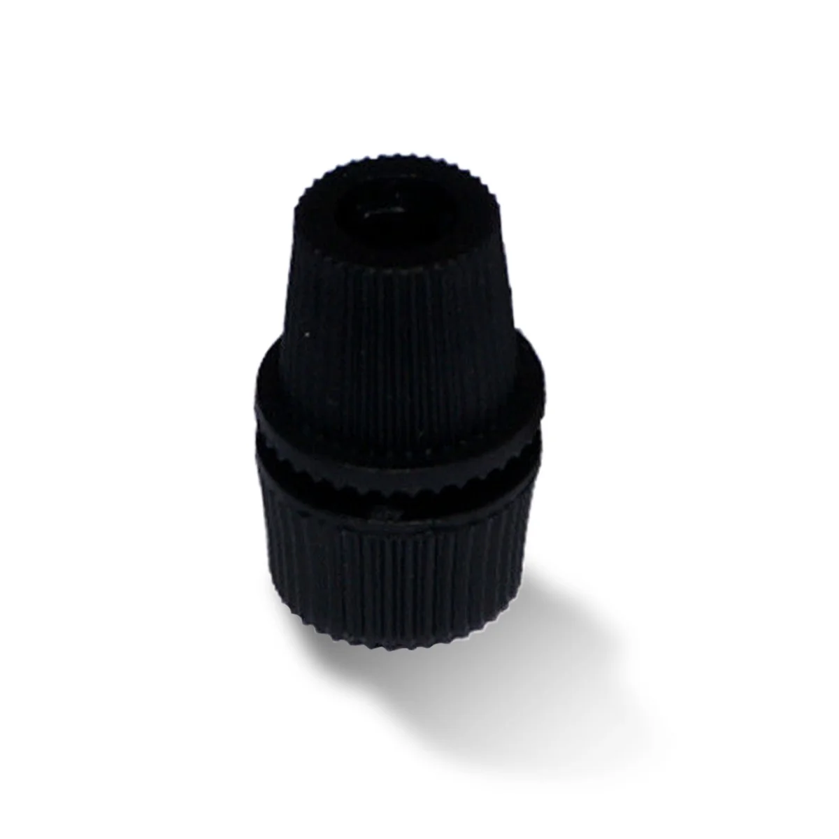 M10 cord grip: compact white plastic housing with M10 female thread, a short bar handle for hand‑tightening, shown snugly gripping a cable.