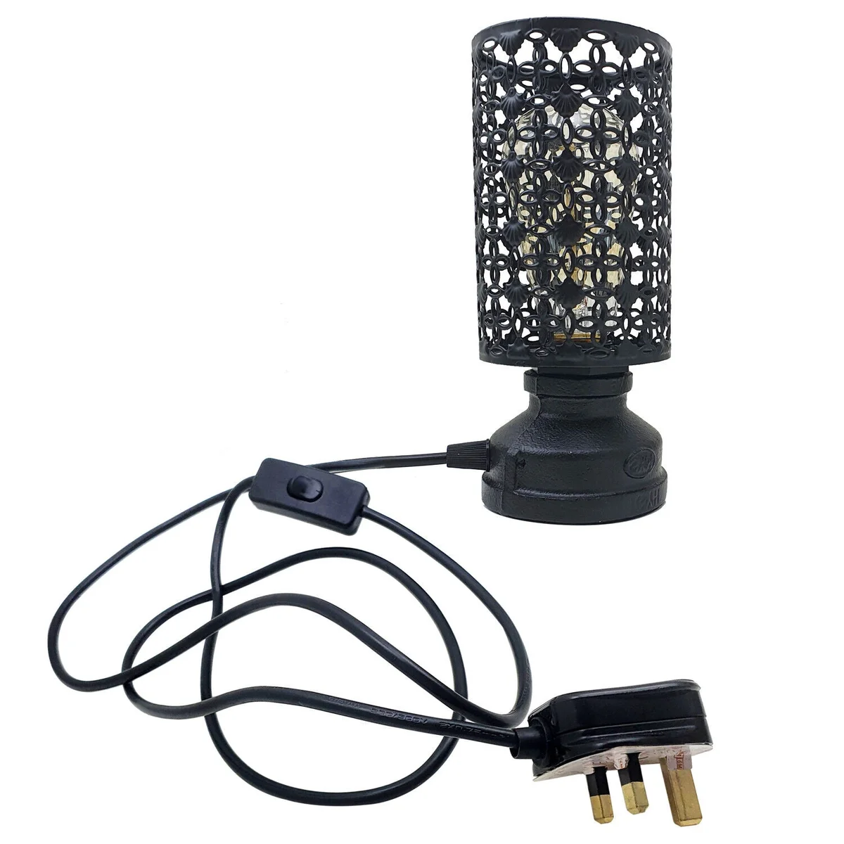 Antique brass table lamp with black metal wire cage and metal lampshade, industrial style.