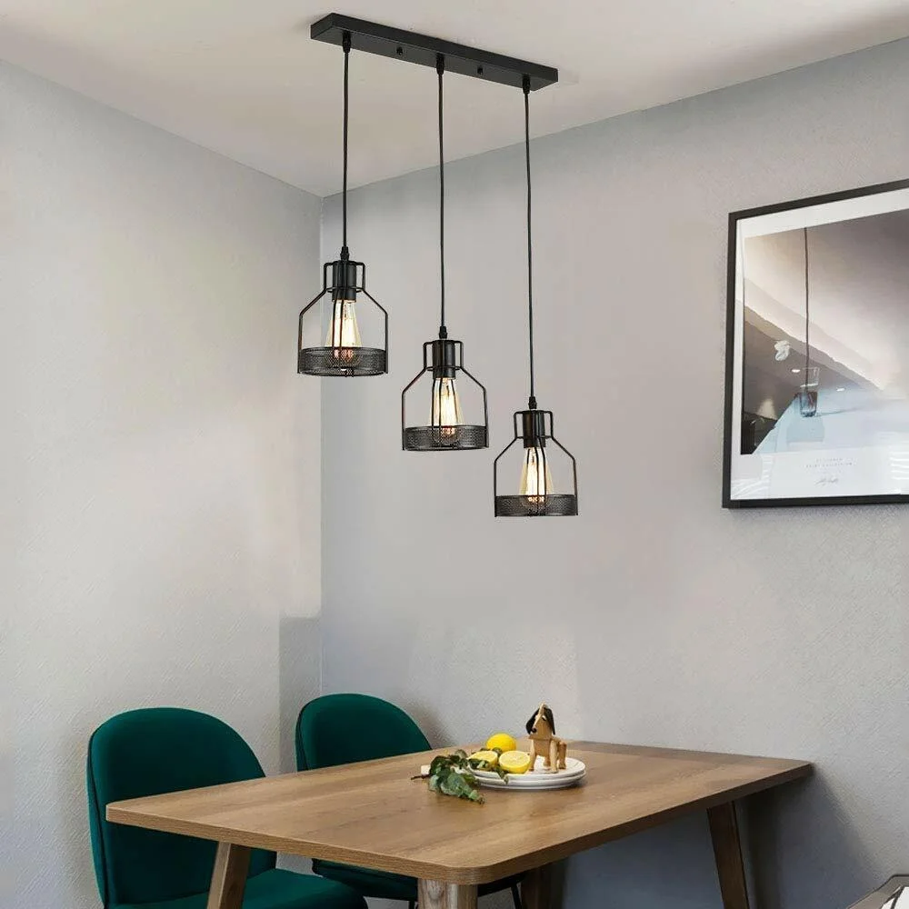 Black metal pendant light shade with three caged lamps, PVC cable, and round mounting base