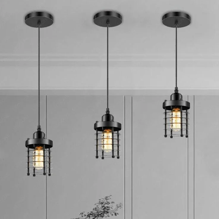 Vintage black metal cage pendant light hanging from a 95cm cable, showcasing stepped cage design and matte black finish.