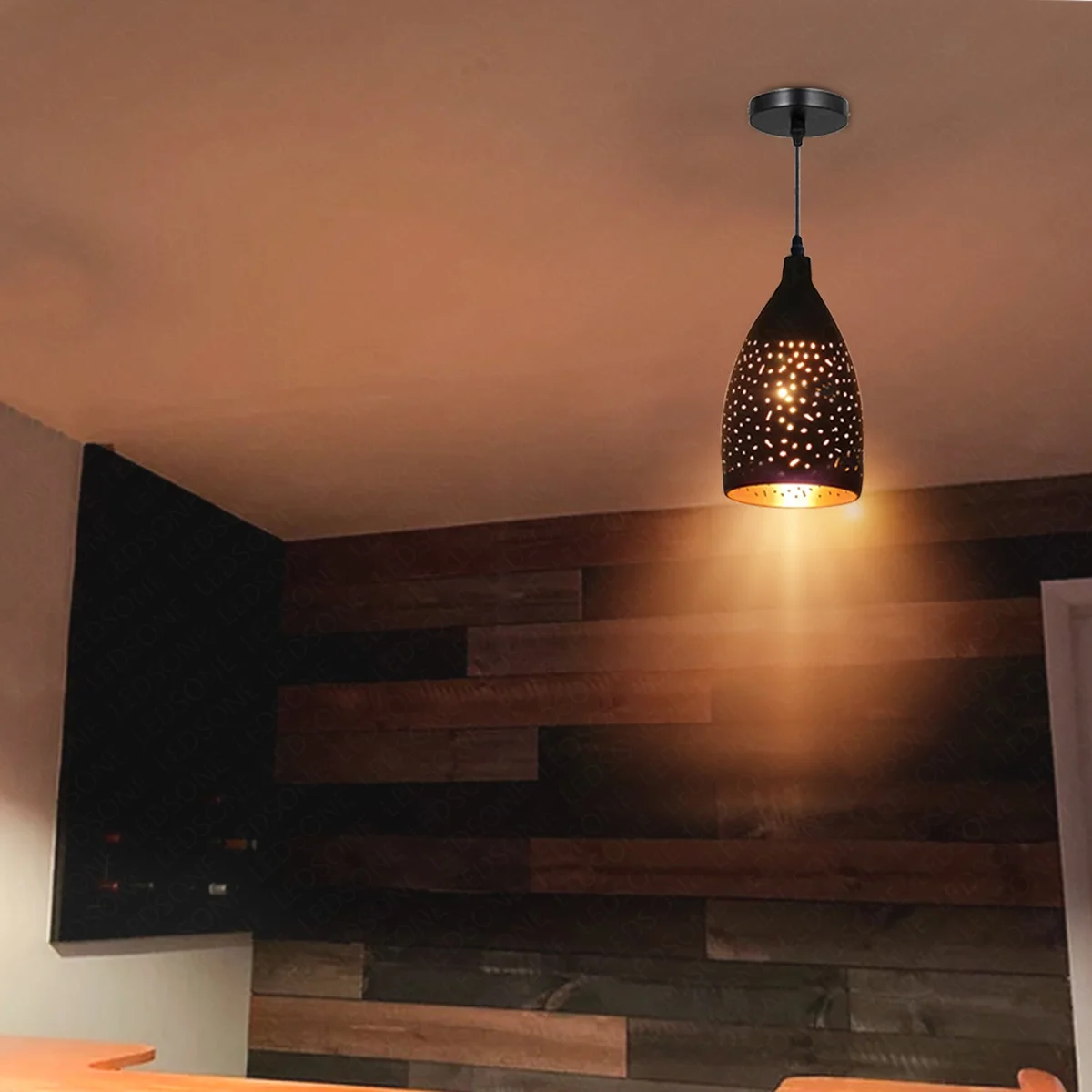 Black pendant light with black shade and gold metal frame, hanging from a 95cm cord, vintage style fixture