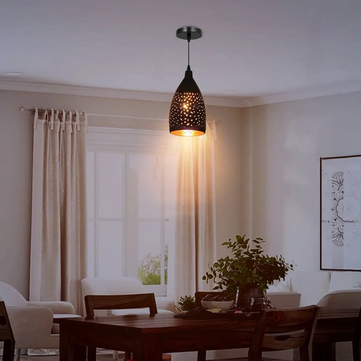 Retro black pendant lamp with gold metal fittings, dark shade and adjustable cable light hanging from wall.