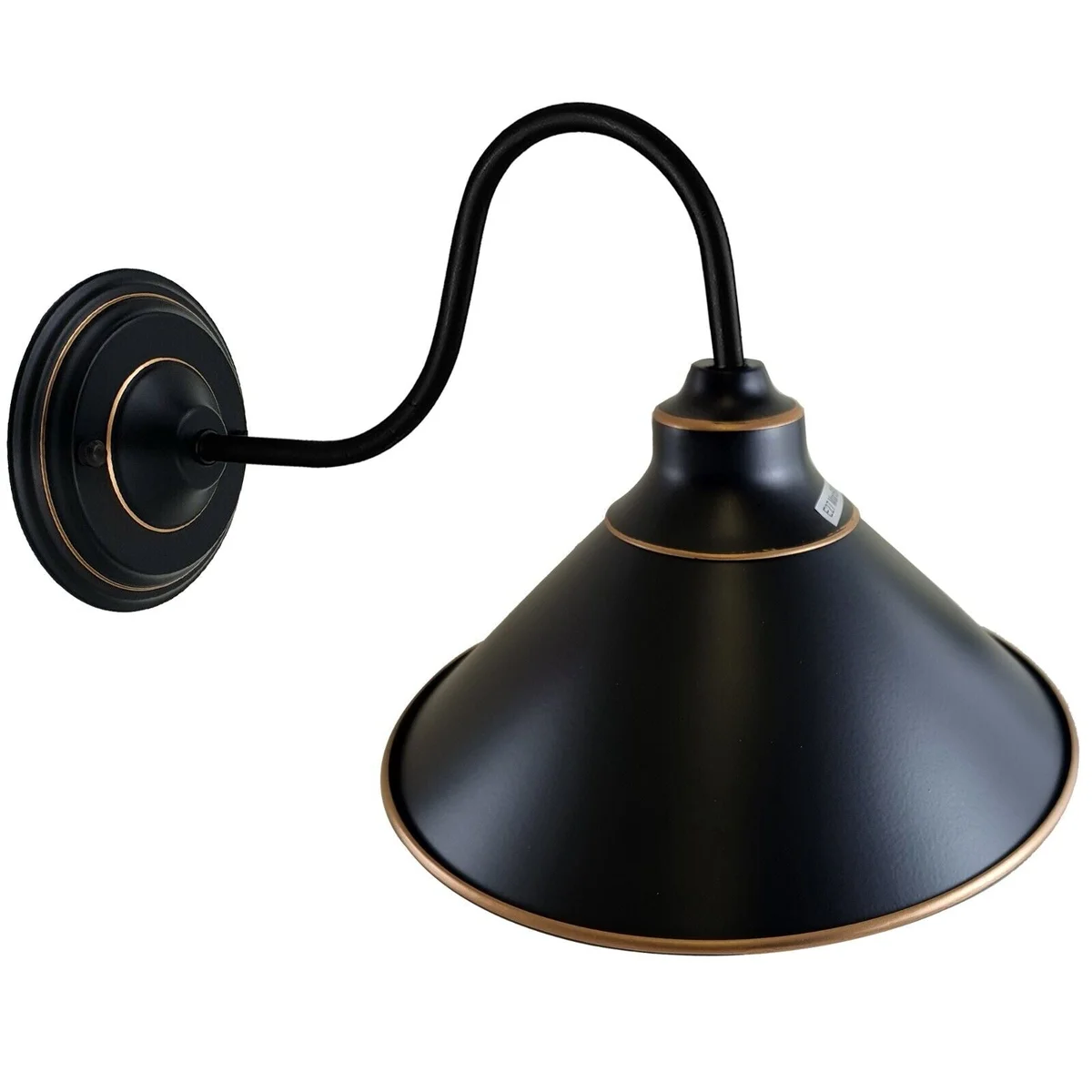 Black metal industrial wall sconce with round canopy, E27 wall light, and metal holder in a stylish living room setting