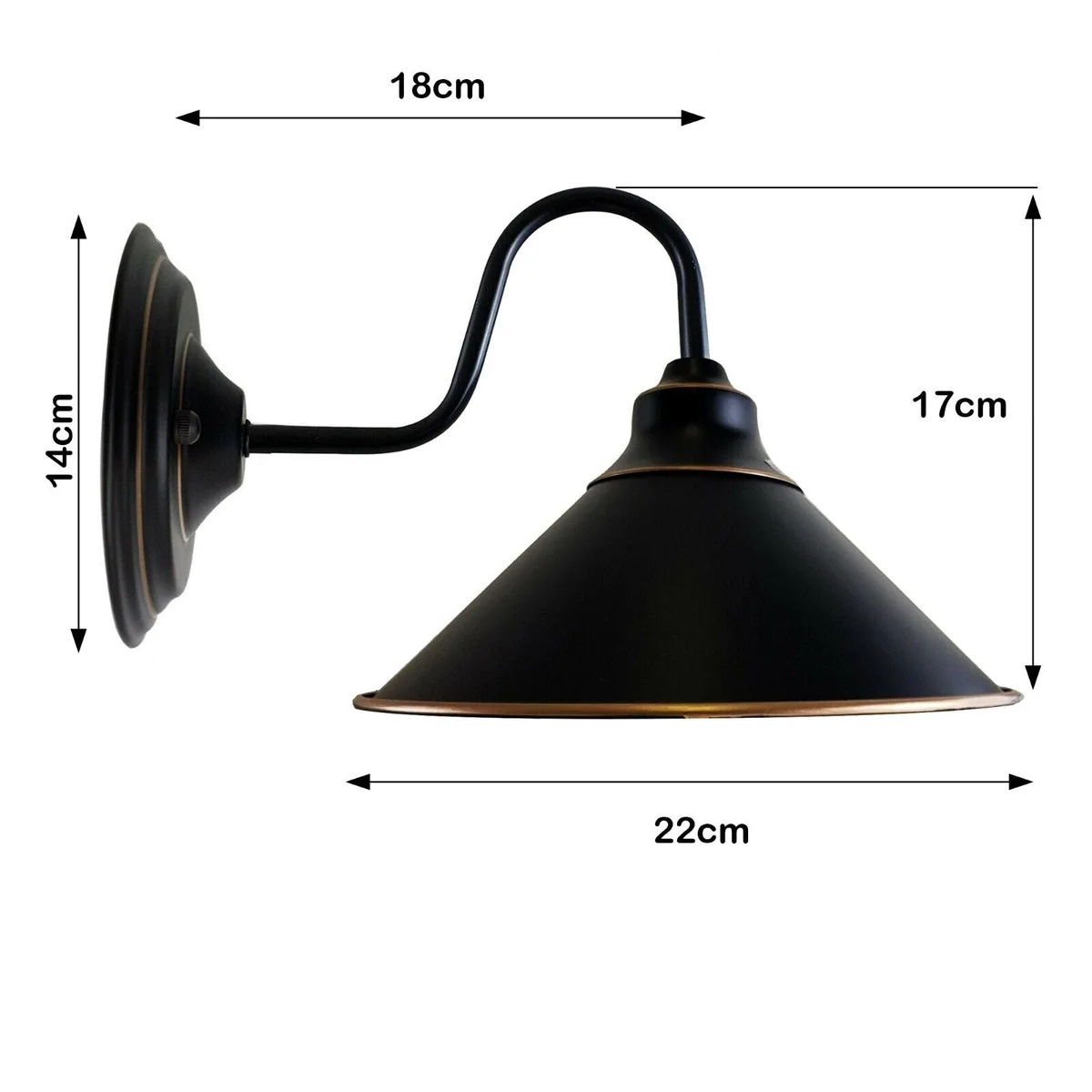 Black metal wall lamp with round plate and E27 holder, hanging on a simple wall.