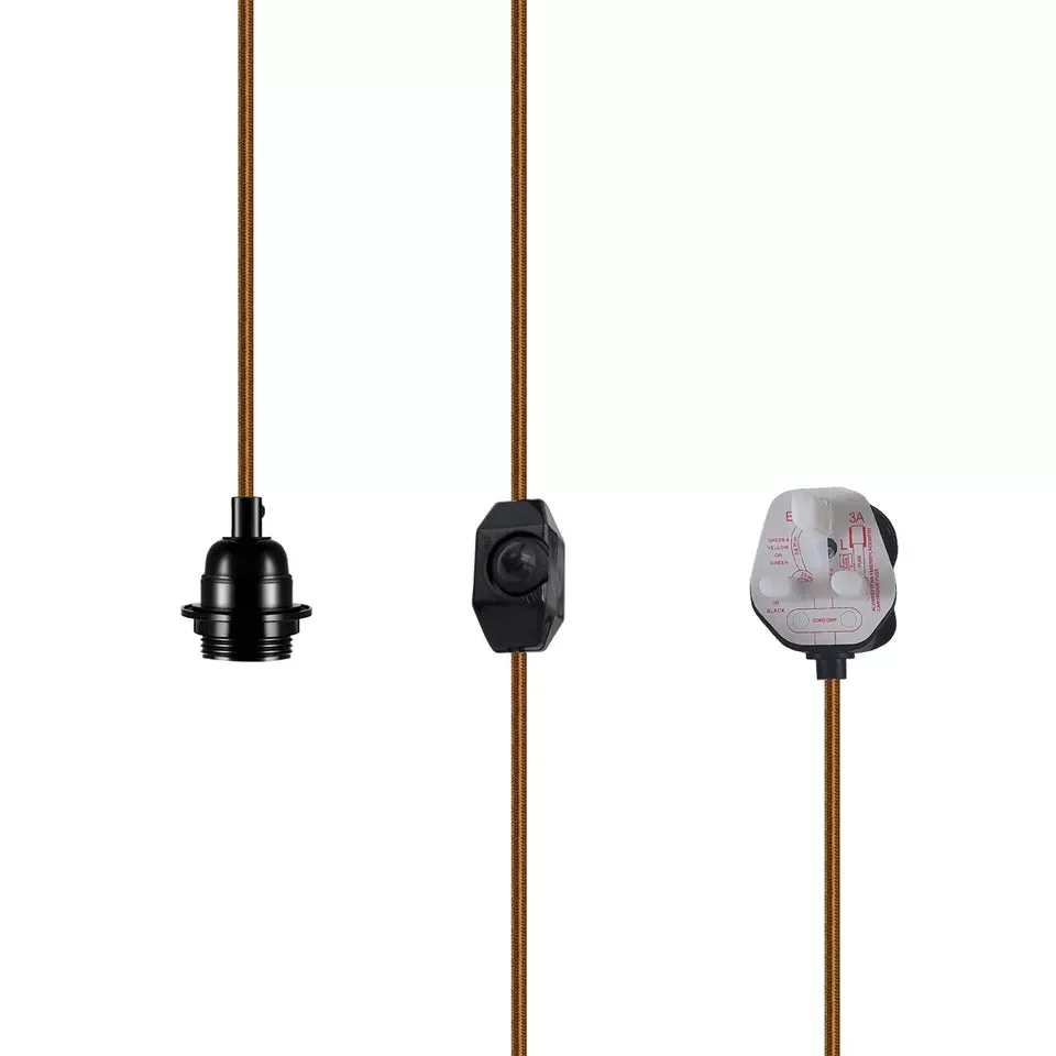 Vintage plug‑in pendant light featuring a gold braided cable, black Bakelite holder, and a classic Edison bulb.