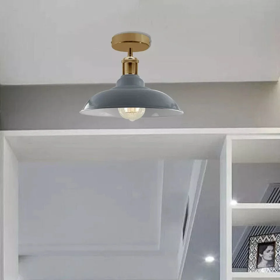 Grey metal indoor ceiling lamp with E27 base and simple shade on a flat ceiling.