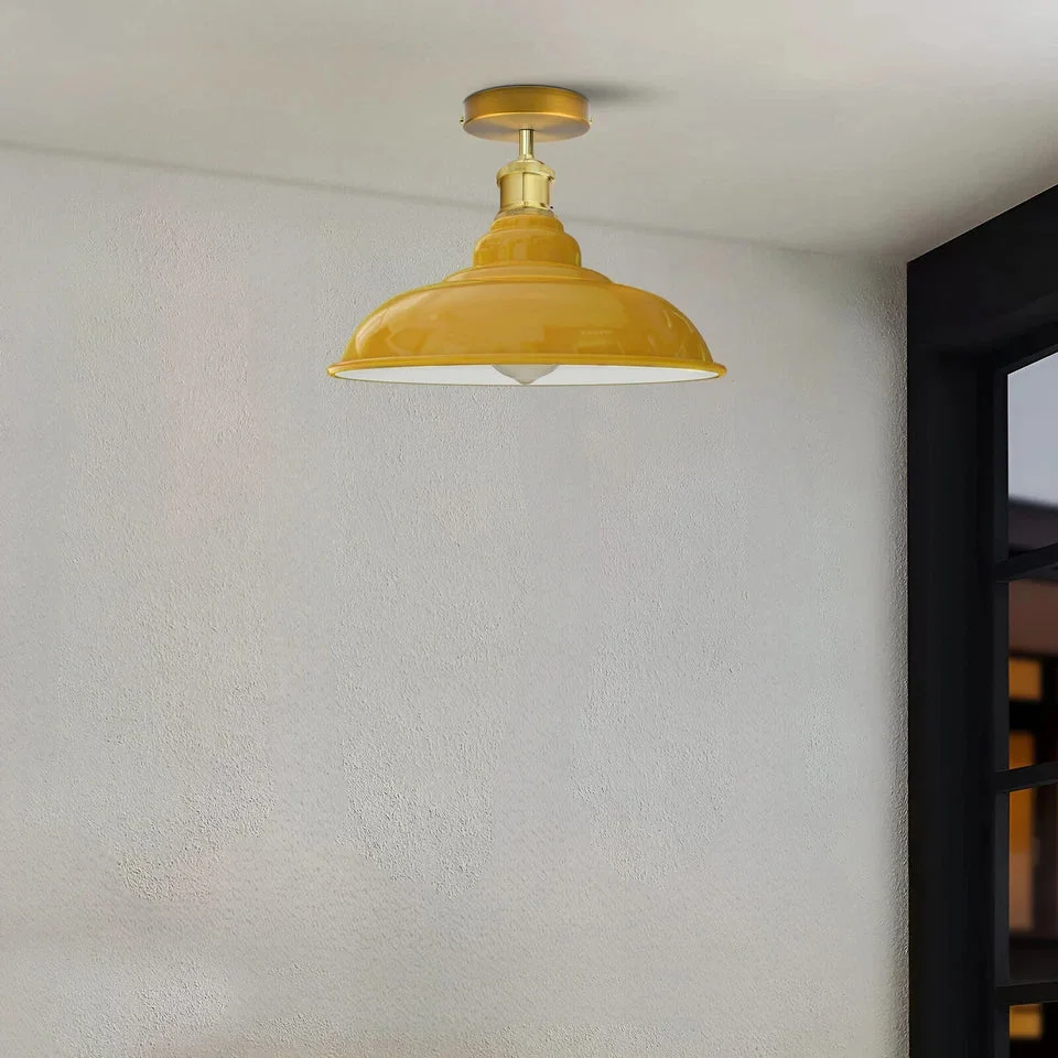 Industrial ceiling light with yellow powder-coated metal shade, semi‑flush mount and factory‑inspired silhouette.