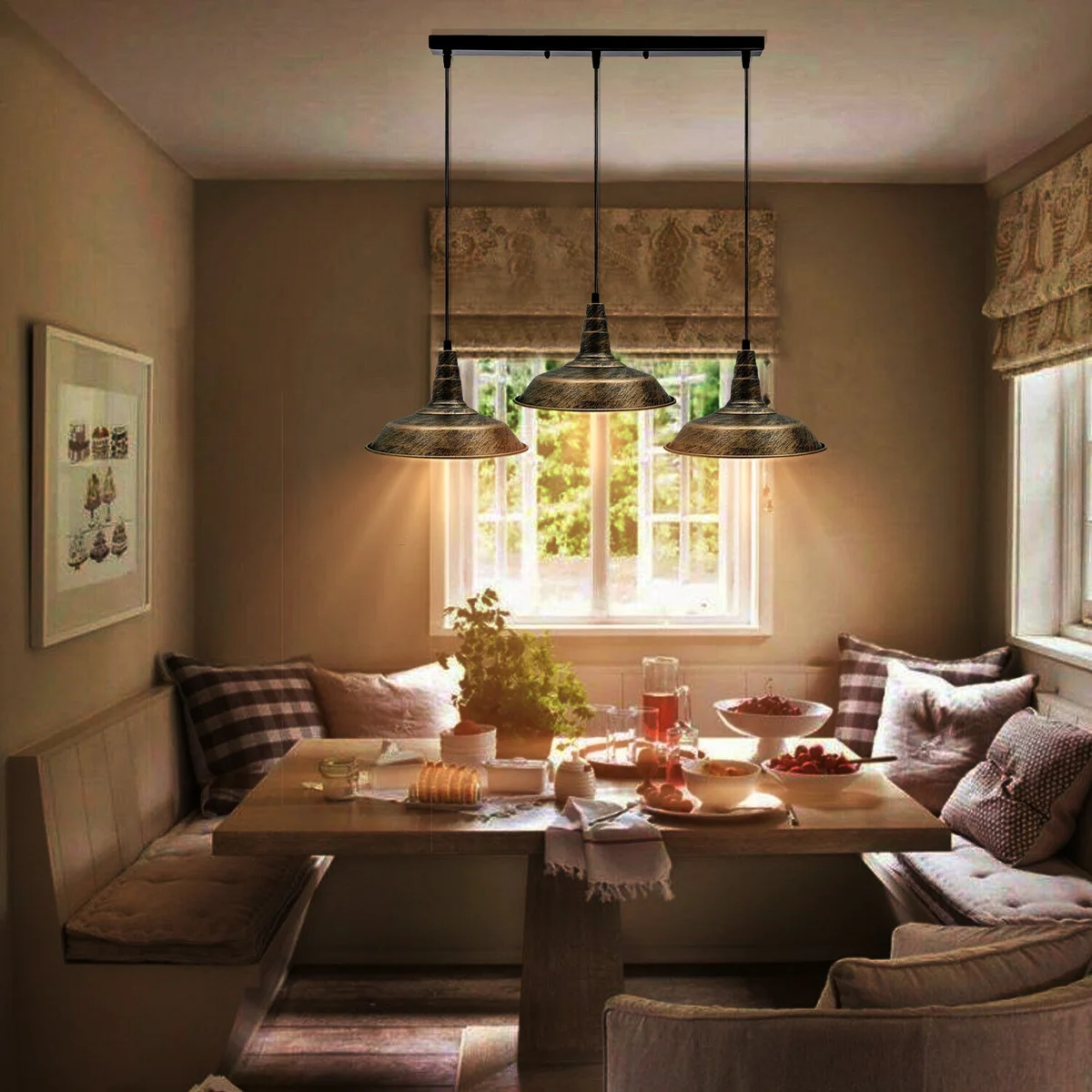 Metal ceiling light over kitchen island, three adjustable PVC cables and metal shades with a copper finish