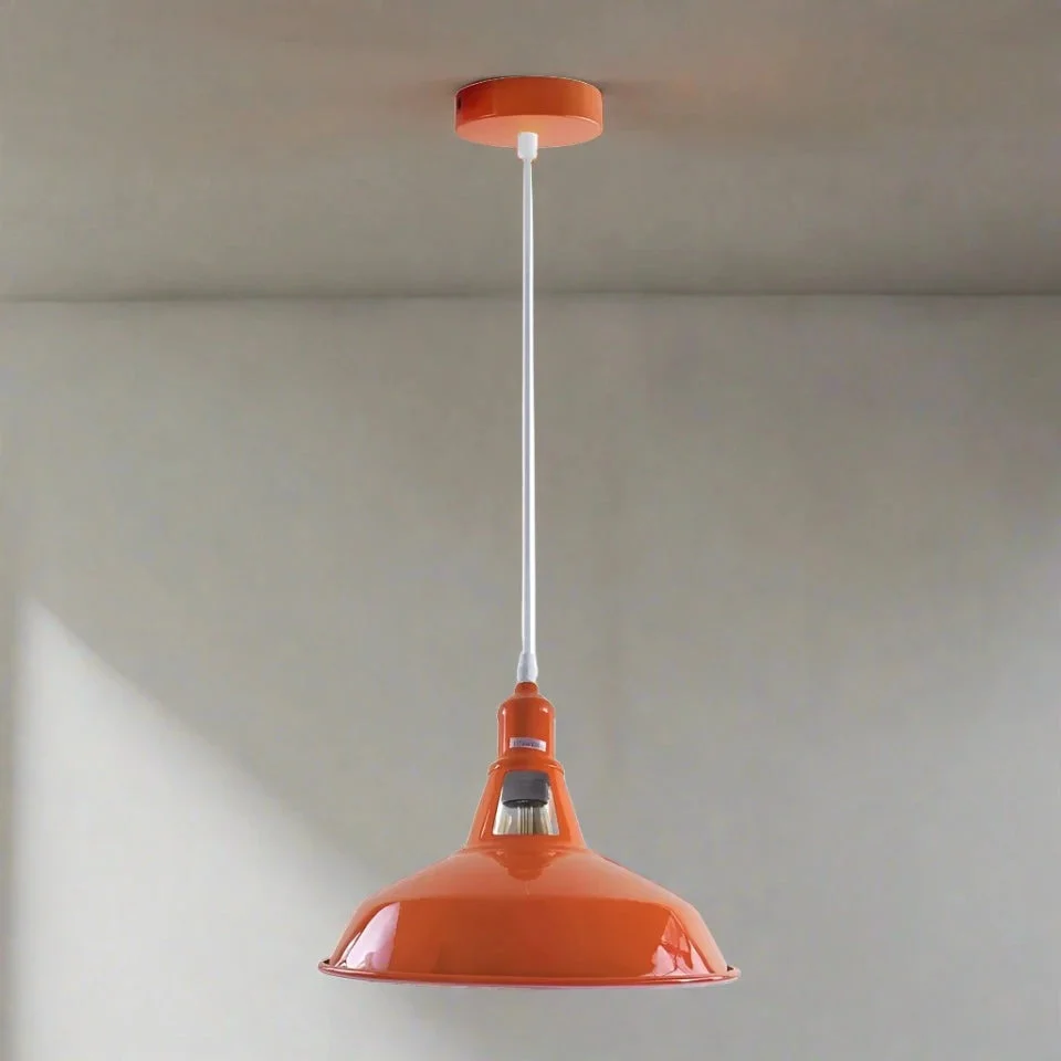 orange pendant light with metal shade, classic retro design, hanging from ceiling