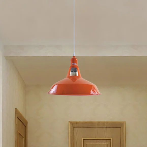 Modern pendant light in orange metal shade hangs from ceiling; includes E27 bulb holder and 95cm PVC cable