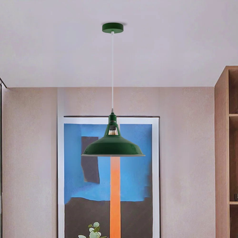 Green pendant ceiling light on a metal mount, green shade, 95cm cord, modern retro design.
