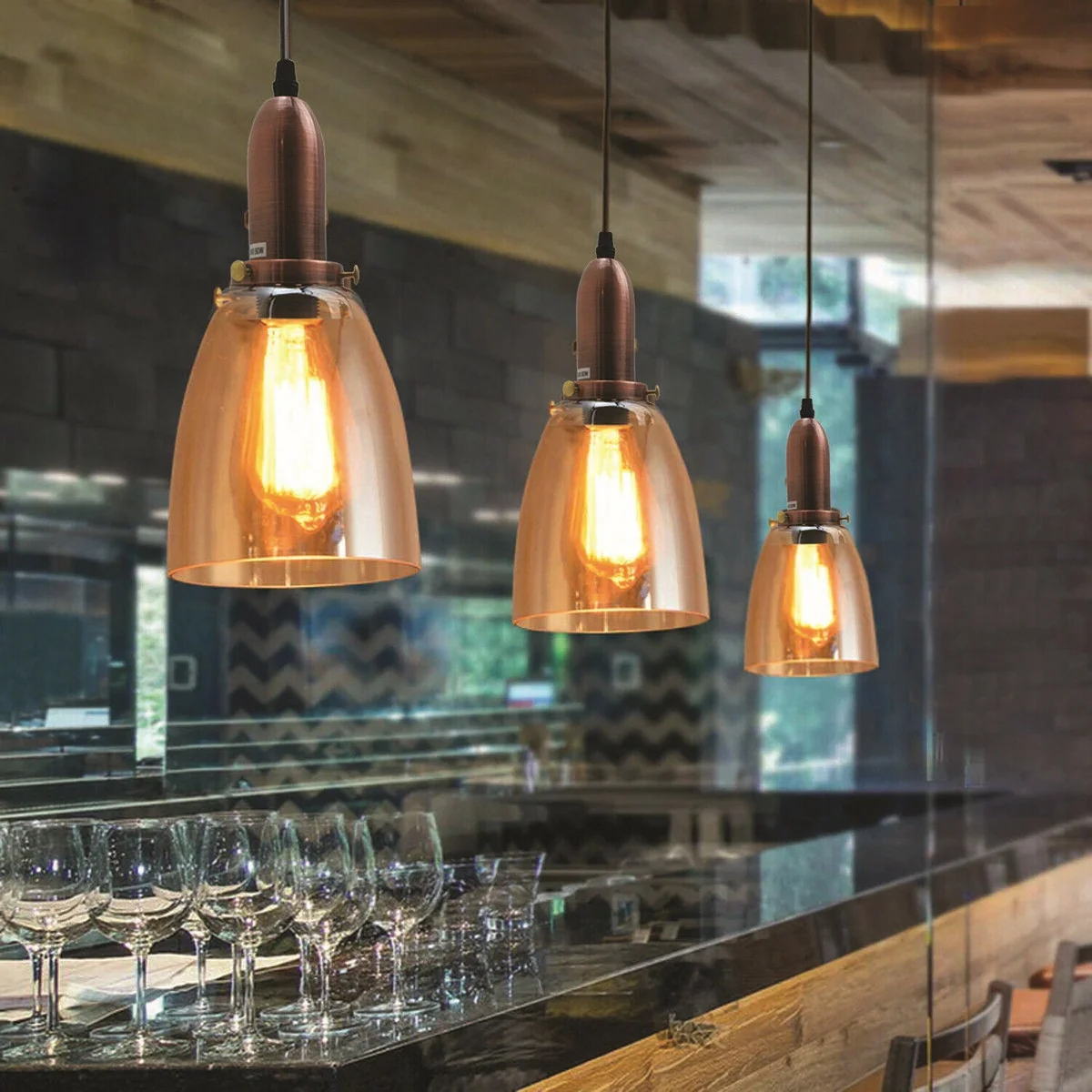 3‑head industrial ceiling light with black metal base, PVC cable, amber glass shades, E27 holders