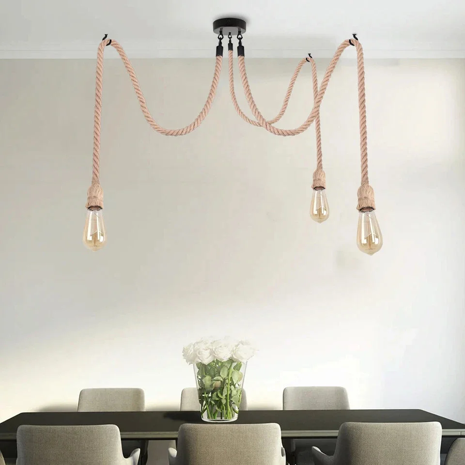 Layered hemp rope pendant light with braided natural hemp cables and metal rose, 3‑head spider configuration.