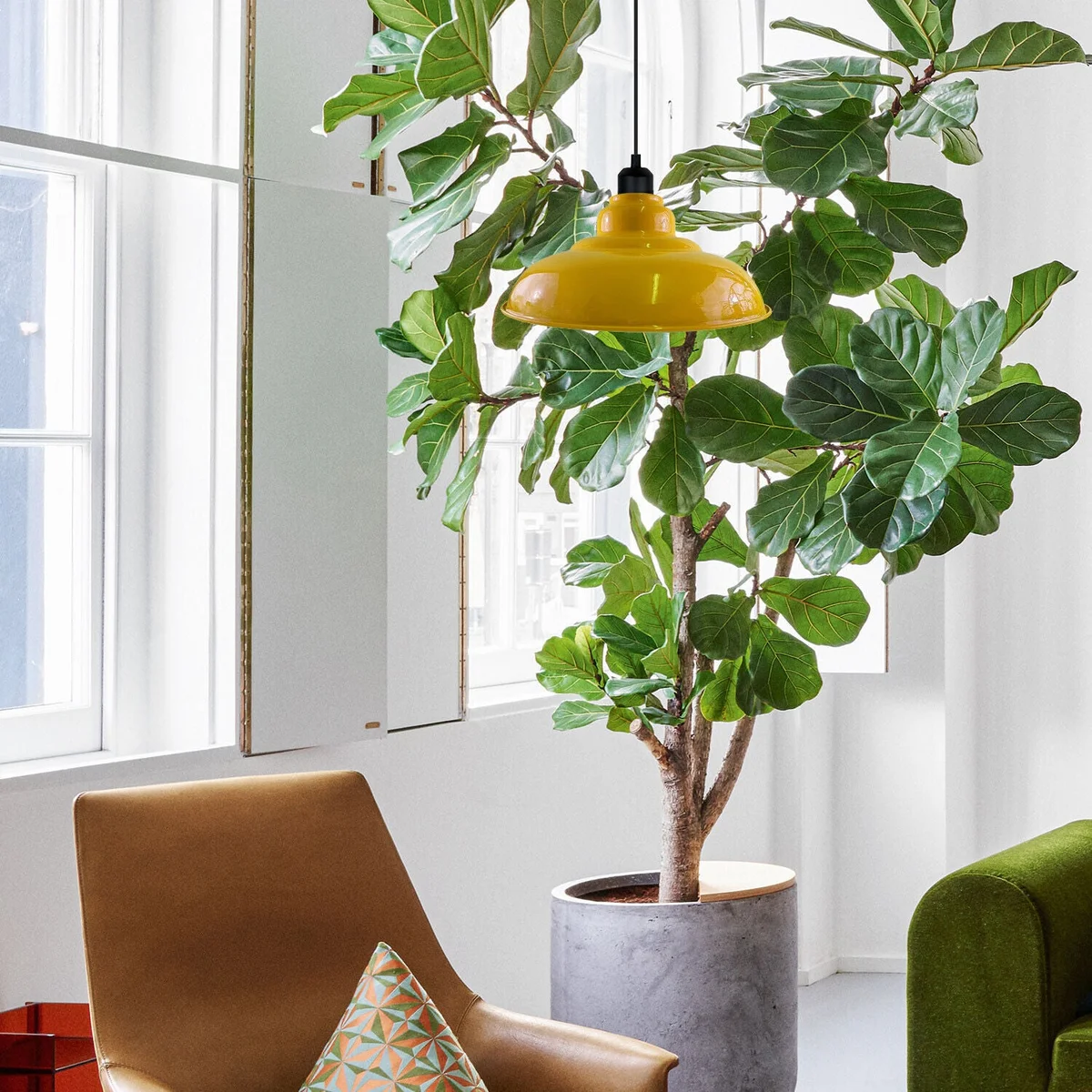 Yellow modern pendant lamp with painted finish, white hood interior, angled base, metal frame and PVC wire.