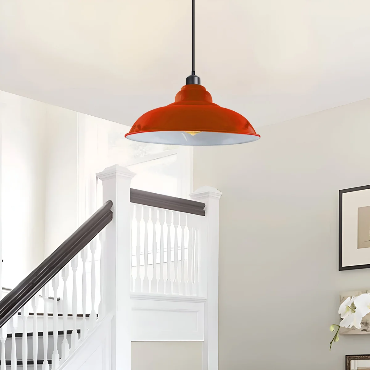 Orange industrial pendant light with angled metal hood, 32 cm globe shade, 95 cm cable, for kitchen island lighting.