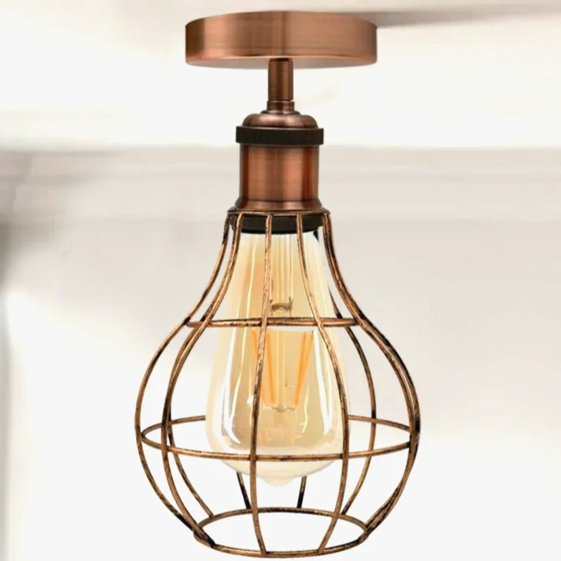 Vintage ceiling lamp with brushed copper base, metal shade, E27 socket visible, flush‑mount design.